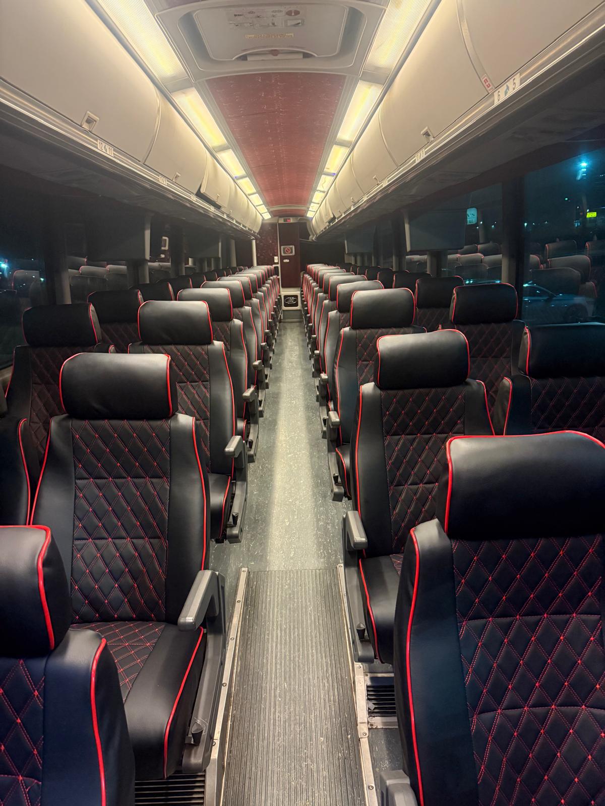 MCI Motorcoach Bus premium leather interior seating — Knight Riders Limo